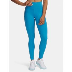 Legginsy treningowe damskie Under Armour Motion. Niebieskie legginsy Under Armour, bez wzorów, sportowe. Za 149.99 zł.