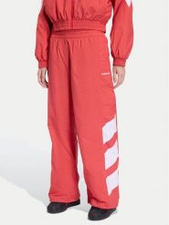 Adidas Spodnie dresowe Blocked Washed KD8791 Czerwony Loose Fit. Czerwone spodnie dresowe adidas, bez wzorów, z dresówki. Za 349.99 zł.