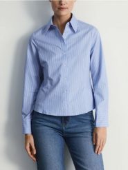 Koszula slim fit - jasnoniebieski. Niebieskie koszule Reserved, l, bez wzorów, z bawełny, bez kołnierzyka, bez ramiączek. Za 99.99 zł.