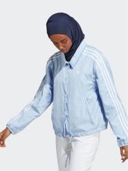 Adidas Kurtka przejściowa Adicolor Classics 3-Stripes Coach Jacket IC5480 Błękitny Loose Fit. Niebieskie kurtki adidas, s, bez wzorów, z syntetyku, bez kaptura. Za 259.99 zł.