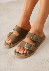 Zielone Klapki VICES z Dwoma Paskami i Metalicznymi Klamrami Kaliniassi. Brązowe klapki Born2be, z aplikacjami, z materiału, z otwartym noskiem, bez obcasa, na płaskiej podeszwie, bez zapięcia. Za 99.99 zł.