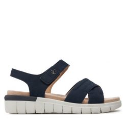 Sandały Caprice. Żółte sandały Caprice, bez wzorów, bez obcasa, na słupku, bez zapięcia. Za 319.99 zł.