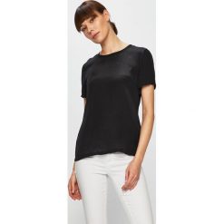 Calvin Klein Jeans - Top. Czerwone t-shirty Calvin Klein Jeans, bez wzorów, z jeansu, casualowe, bez kołnierzyka, bez ramiączek. W wyprzedaży za 159.90 zł.