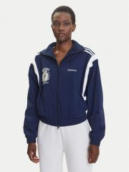 Adidas Bluza Mascotte Woven JY2809 Granatowy Regular Fit. Niebieskie bluzy adidas, s, bez wzorów, z syntetyku, bez kaptura. Za 399.99 zł.