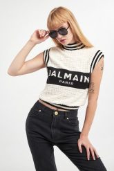 Top wełniany damski BALMAIN. Topy Balmain, bez wzorów, z wełny, bez kołnierzyka, bez ramiączek. W wyprzedaży za 3,381.75 zł.