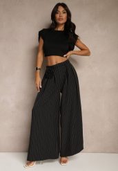 Czarne Spodnie Palazzo High Waist Ozdobione Broszką Kwiatem Folassea. Czarne jeansy Renee, l, z aplikacjami, z jeansu, z podwyższonym stanem. W wyprzedaży za 75.99 zł.