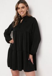 Czarna Rozkloszowana Sukienka z Falbanką Uxaria. Czarne sukienki Born2be, uniwersalny, z aplikacjami, eleganckie, bez kołnierzyka, bez ramiączek, mini, rozkloszowane. W wyprzedaży za 84.99 zł.