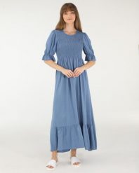 GŁADKA SUKIENKA Z FALBANĄ. Niebieskie sukienki Unisono, l, bez wzorów, bez kołnierzyka, bez ramiączek, midi. Za 189.00 zł.