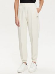 Guess Spodnie dresowe V5RB11 KCAY2 Écru Regular Fit. Spodnie dresowe Guess, z aplikacjami, z dresówki. Za 329.99 zł.