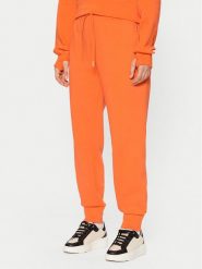 Lacoste Spodnie dresowe XF0343 Pomarańczowy Regular Fit. Brązowe spodnie dresowe Lacoste, bez wzorów, z bawełny. Za 439.99 zł.
