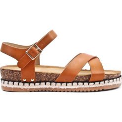 Sandały espadryle z plecionką i sprzączką camel. Brązowe sandały Inna, bez wzorów, z materiału, wakacyjne, bez obcasa, bez zapięcia. W wyprzedaży za 65.44 zł.