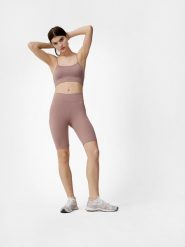 4F Legginsy kolarki treningowe z dodatkiem materiałów z recyklingu damskie S. Brązowe legginsy 4f, bez wzorów, z dzianiny. Za 129.99 zł.