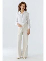 Oui Dżinsy - Comfort fit - w kolorze kremowym rozmiar: 36. Brązowe jeansy Oui, z aplikacjami, ze skóry, z podwyższonym stanem. Za 280.44 zł.