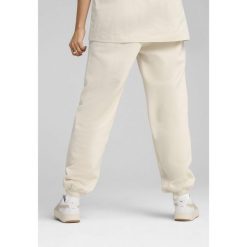 Spodnie dresowe unisex Essentials Elevated PUMA Alpine Snow White. Białe spodnie dresowe Puma, bez wzorów, z dresówki. W wyprzedaży za 179.00 zł.
