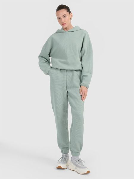 4F Spodnie dresowe z waflowej dzianiny damskie - turkusowe XXL. Niebieskie spodnie dresowe 4f, bez wzorów, z dresówki. Za 169.99 zł.