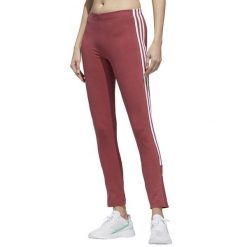 Spodnie legginsy damskie adidas W New A 78 TIG. Czerwone legginsy adidas, bez wzorów, sportowe. Za 120.99 zł.