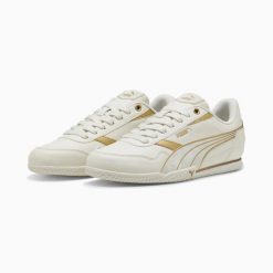 Buty sportowe damskie Puma BELLA DONNA DAYINIGHT 40267501. Brązowe buty treningowe Puma, bez wzorów, z gumy, bez zapięcia. Za 184.26 zł.