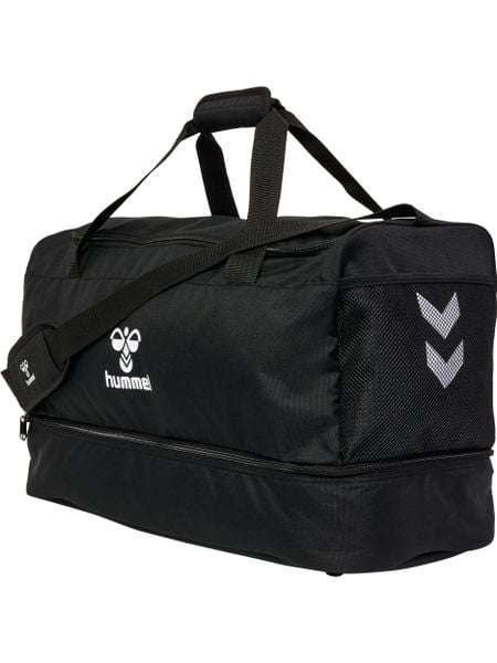 Torba sportowa Hummel Core 2.0. Czarne torby sportowe Hummel, bez wzorów, z materiału, na ramię. Za 185.45 zł.
