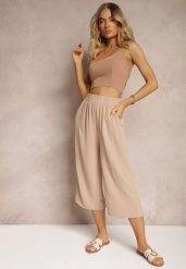 Ciemnobeżowe Spodnie Palazzo z Gumką w Talii i Długością Nogawki 3/4 Moolia. Brązowe jeansy Renee, plus size, bez wzorów, z jeansu. W wyprzedaży za 29.99 zł.