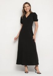 Czarna Sukienka Rozkloszowana z Trójkątnym Dekoltem Efralinae. Czarne sukienki Born2be, na imprezę, l, bez wzorów, eleganckie, bez kołnierzyka, bez ramiączek, maxi, rozkloszowane. W wyprzedaży za 127.49 zł.