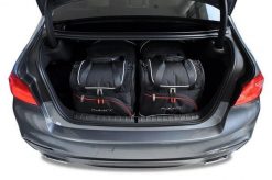 Torby Do Bagażnika Bmw 5 Limousine 2016-2023 4Szt Kjust. Czarne torby podróżne KJUST, bez wzorów, z kauczuku. Za 1,249.00 zł.