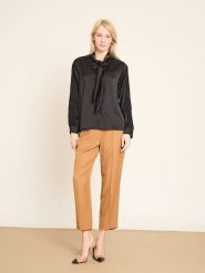 BGN Bluzka w kolorze czarnym rozmiar: 40. Czarne bluzki BGN, bez wzorów, z koronki, bez kołnierzyka, bez ramiączek. Za 143.99 zł.