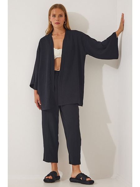 Happiness Istanbul 2-częściowy zestaw w kolorze czarnym rozmiar: 40. Czarne spodnie materiałowe Happiness Istanbul, bez wzorów, z materiału, z podwyższonym stanem. Za 78.84 zł.