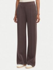 Guess Spodnie dresowe V6YB18 K4315 Brązowy Regular Fit. Brązowe spodnie sportowe Guess, z aplikacjami, z dresówki. Za 394.99 zł.