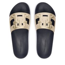 Klapki Tommy Hilfiger. Żółte klapki Tommy Hilfiger, bez wzorów, bez obcasa, bez zapięcia. Za 189.99 zł.