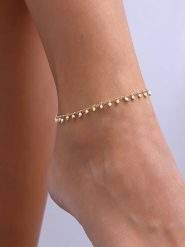 Luja Bijoux Pozłacana bransoletka z kryształami na kostkę rozmiar: onesize. Białe bransoletki Luja Bijoux, z kryształem, pozłacane. Za 52.67 zł.