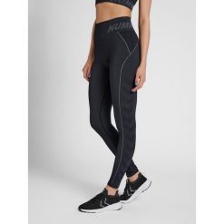 Damskie legginsy ze średnim stanem Hummel TE Christel. Czarne legginsy Hummel, bez wzorów, sportowe. Za 158.50 zł.