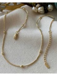 Luseera Pozłacany naszyjnik z elementami ozdobnymi - dł. 45 cm rozmiar: onesize. Żółte naszyjniki Luseera, z materiału, pozłacane. Za 43.99 zł.