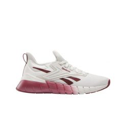 Buty treningowe damskie Reebok Nano Gym. Czerwone buty treningowe Reebok, bez wzorów, z materiału, bez zapięcia, na fitness i siłownię. Za 389.99 zł.