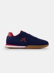 Buty Le Coq Sportif Veloce. Niebieskie buty treningowe Le Coq Sportif, bez wzorów, z materiału, bez zapięcia, trekkingowe. Za 387.00 zł.