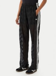 Adidas Spodnie dzianinowe Crochet Firebird KD0346 Czarny Regular Fit. Czarne spodnie materiałowe adidas, bez wzorów, z dzianiny. Za 359.99 zł.