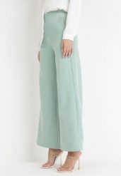 Jasnozielone Spodnie Szerokie Antile. Zielone jeansy Born2be, l, bez wzorów, z jeansu, eleganckie, z podwyższonym stanem, długie. Za 119.99 zł.