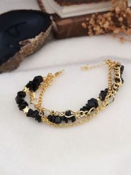 L'Atelier de Gaia Pozłacana bransoletka z elementami ozdobnymi rozmiar: onesize. Czarne bransoletki L'Atelier de Gaia, z onyksem, pozłacane. Za 39.99 zł.