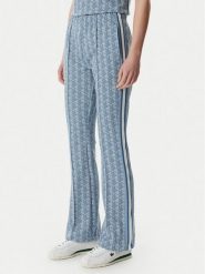 Lacoste Spodnie dresowe XF9313 Niebieski jasny Regular Fit. Niebieskie spodnie sportowe Lacoste, bez wzorów, z bawełny. Za 739.99 zł.