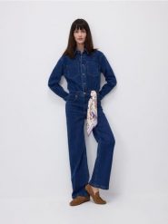 Jeansowy kombinezon - granatowy. Niebieskie kombinezony Reserved, l, bez wzorów, z bawełny, bez kołnierzyka, bez ramiączek. Za 259.99 zł.