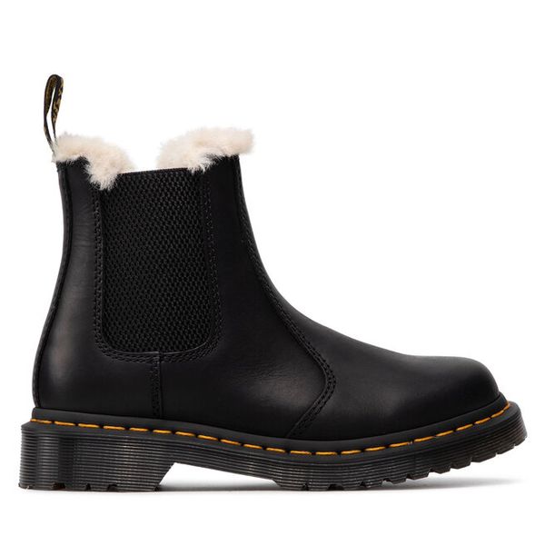 Sztyblety Dr. Martens. Czarne botki Dr Martens, bez wzorów, bez obcasa, na płaskiej podeszwie, bez zapięcia. Za 989.99 zł.