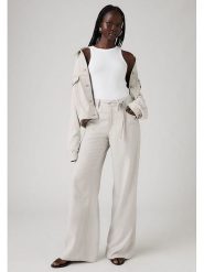 Levi's Spodnie - Comfort fit - w kolorze kremowym rozmiar: W30/L31. Brązowe spodnie materiałowe Levi's, bez wzorów, z materiału, klasyczne. Za 209.33 zł.