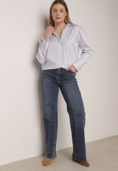 Niebieskie Jeansy z Wysokim Stanem i Szerokimi Nogawkami Henivia. Niebieskie jeansy Born2be, l, bez wzorów, z jeansu, eleganckie, z podwyższonym stanem. Za 119.99 zł.