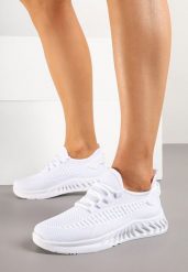 Białe Buty Sportowe Sneakersy z Siateczkowego Materiału na Tłoczonej Podeszwie Ralloti. Białe buty sportowe lifestyle Born2be, bez wzorów, z jeansu, casualowe, z okrągłym noskiem, bez zapięcia. W wyprzedaży za 63.99 zł.