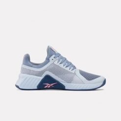 Damskie buty treningowe Reebok FLIP CHARGE 100272254 jasnoniebieskie. Niebieskie buty treningowe Reebok, bez wzorów, bez zapięcia, na fitness i siłownię. Za 303.00 zł.