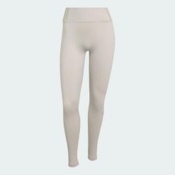 Legginsy All Me w wersji zimowej. Szare legginsy adidas, bez wzorów, z elastanu, eleganckie. Za 299.00 zł.