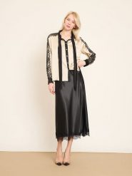 BGN Bluzka w kolorze kremowo-czarnym rozmiar: 34. Brązowe bluzki BGN, bez wzorów, z koronki, bez kołnierzyka, bez ramiączek. Za 143.99 zł.