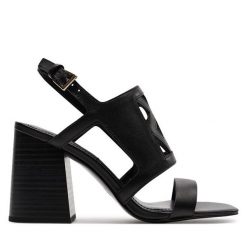 Sandały DKNY. Czarne sandały DKNY, bez wzorów, bez obcasa, na słupku, bez zapięcia. Za 559.99 zł.