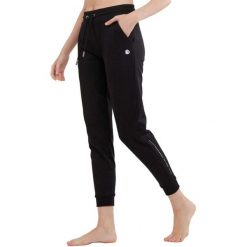 Spodnie treningowe damskie Fundango Stellar. Czarne spodnie dresowe FUNDANGO, bez wzorów. Za 179.90 zł.