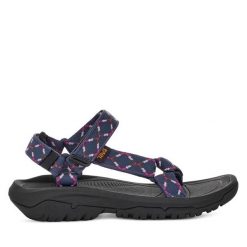 Sandały Teva. Niebieskie sandały Teva, bez wzorów, sportowe, bez obcasa, bez zapięcia. Za 279.99 zł.