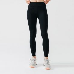 Legginsy do biegania damskie Kalenji Warm ocieplane. Czarne legginsy KALENJI, bez wzorów, z elastanu, sportowe. Za 59.99 zł.